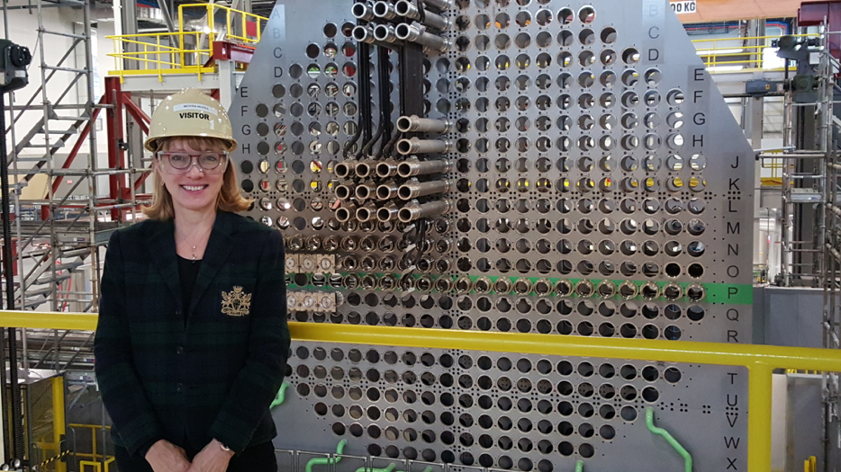 Chalmers new DOMB, Moyra McDill, Professor Emeritus  from Carleton University (Ottawa, Canada) and outgoing Commissioner of the Canadian Nuclear Safety Commission standing in front of the full-scale reactor mock-up developed by Ontario Power Generation for the purposes of training for refurbishment of four CANDU reactors at the Darlington Nuclear Generating Station.